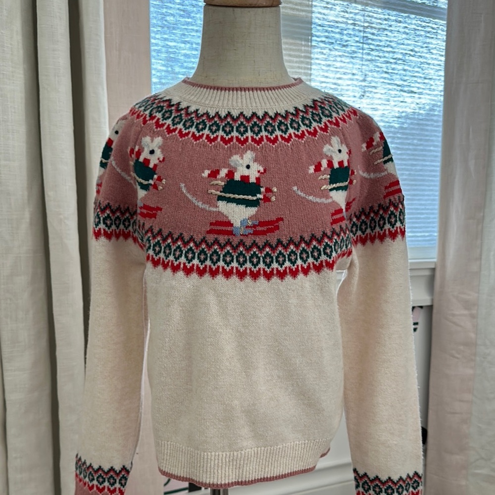 Cozy Pink and Cream Sweater with Festive Design